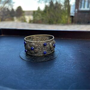 Vintage-Inspired Filigree Cuff Bracelet with Blue Bead Accents